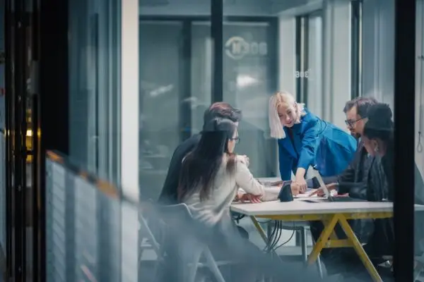 Coworkers preparing their operations optimization plan