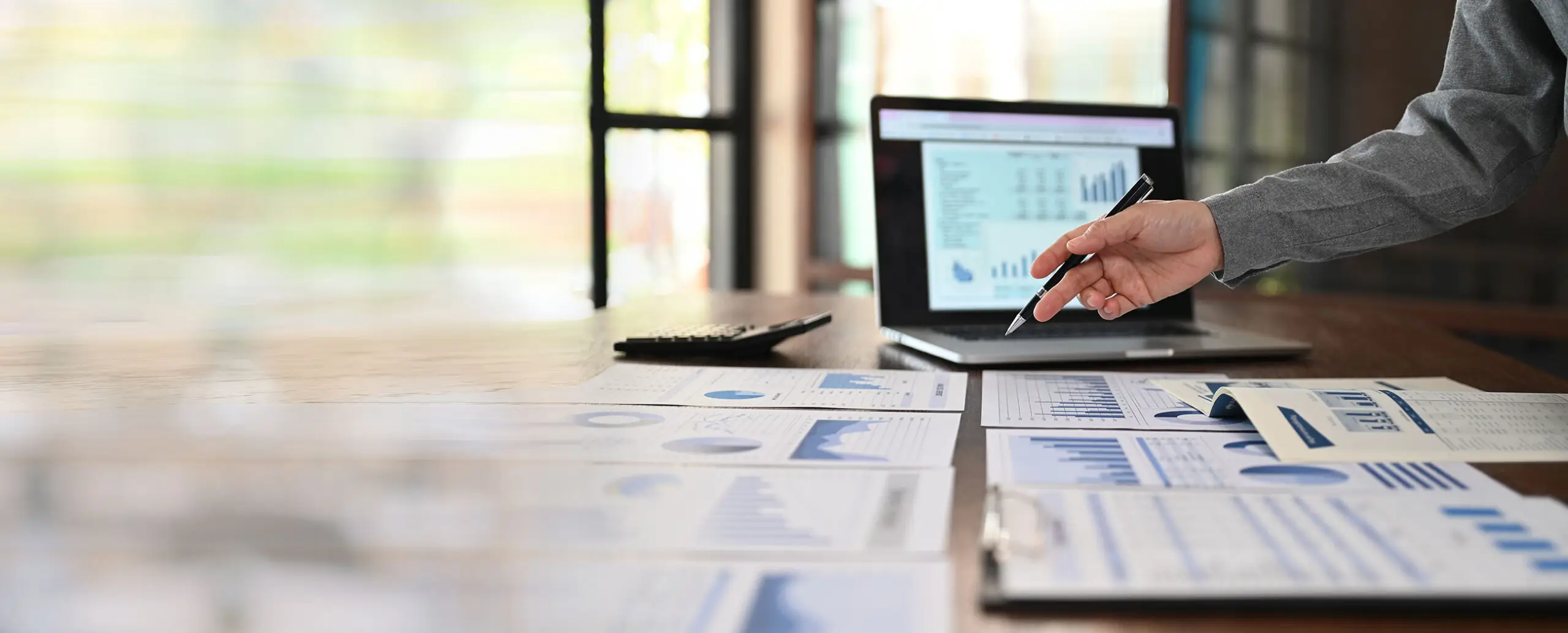 business analyst analyzing operating results from business and financial report. Concept of business planning ,accounting, business analysis,financial planning,data analysis.